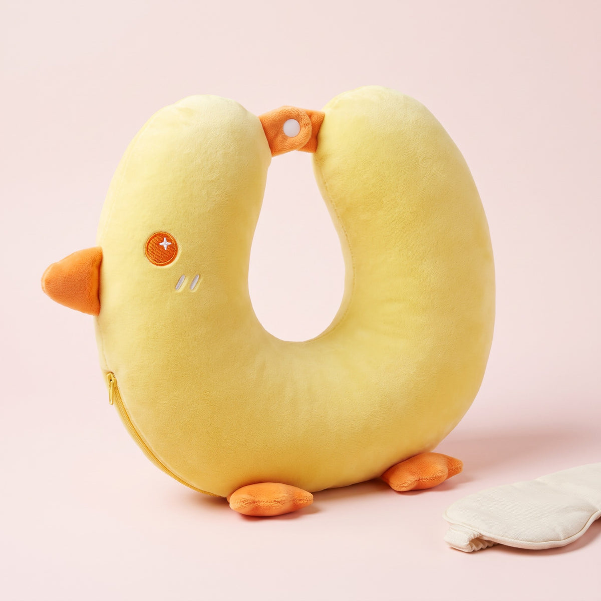 Snugglet Flight Chick in Yellow, memory foam travel neck pillow shaped like a chick