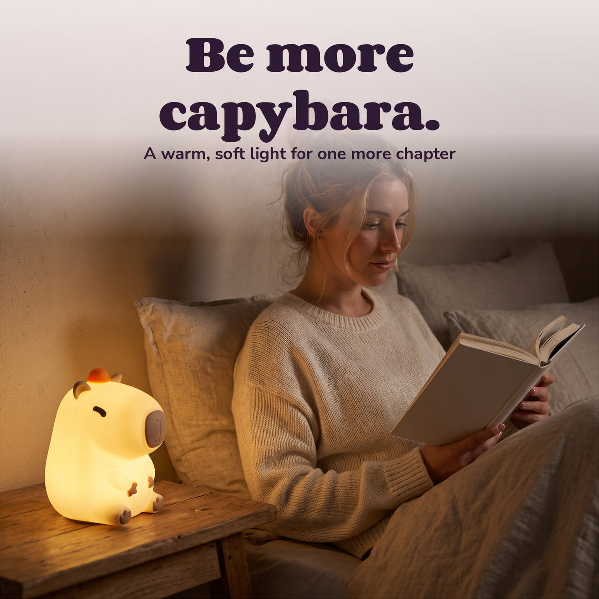 Woman using the Snugglet Capy Glow – Be more capybara.