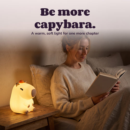 Woman using the Snugglet Capy Glow – Be more capybara.