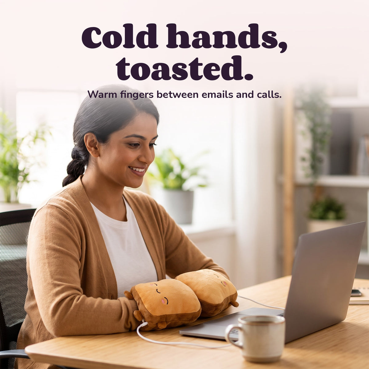 Woman using the Snugglet Toast Mitts – Cold hands, toasted.