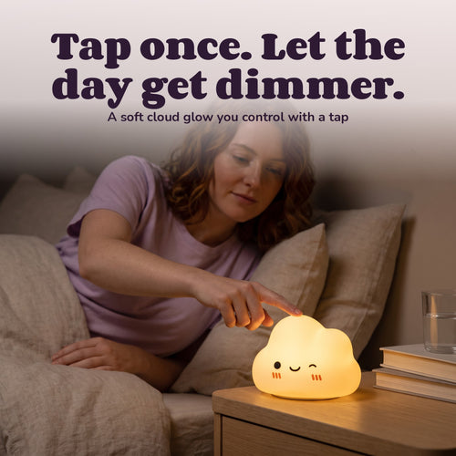 Woman using the Snugglet Cloud Glow – Tap once. Let the day get dimmer.