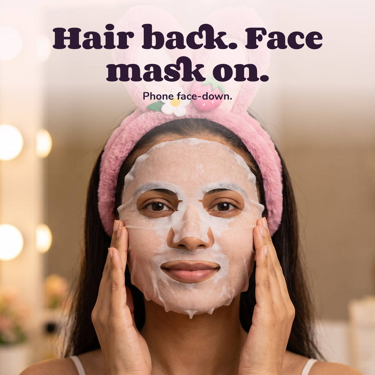 Woman using the Snugglet Spa Band – Hair back. Face mask on.