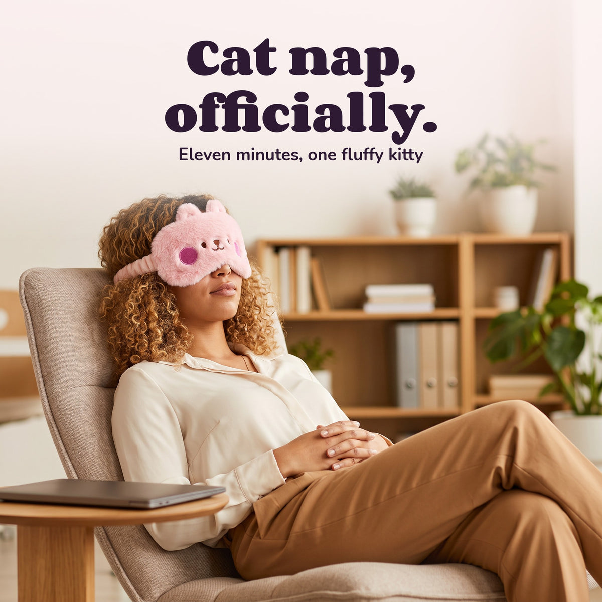 Woman using the Snugglet Nap Kitty – Cat nap, officially.