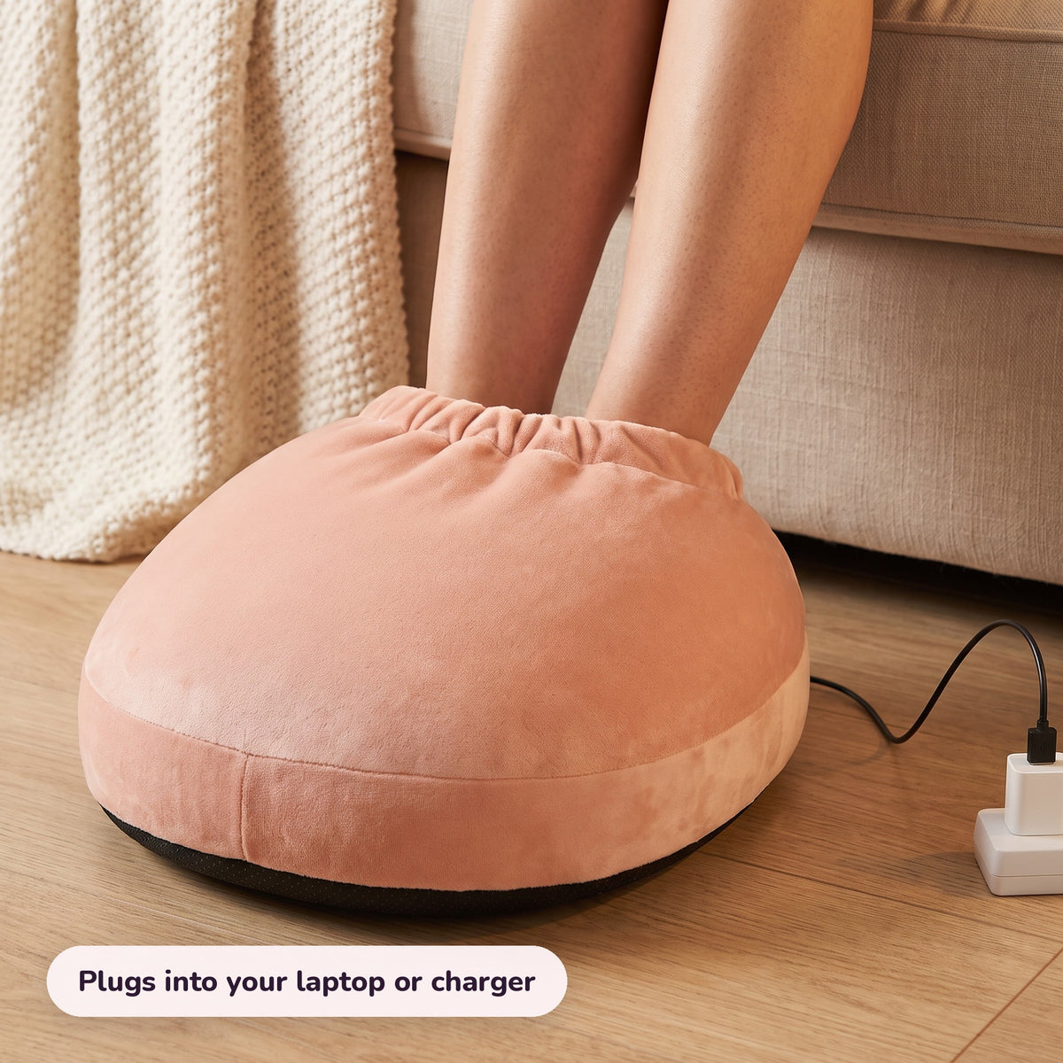 Snugglet Paw Warmer in use – Plugs into your laptop or charger