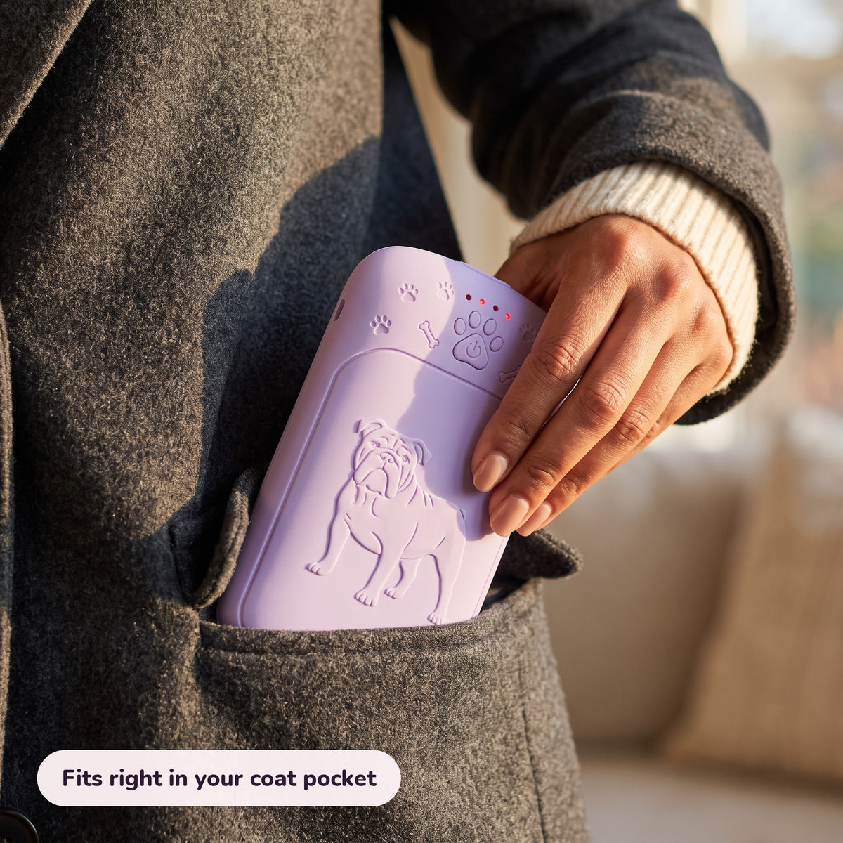 Snugglet Pup Warmer in use – Fits right in your coat pocket