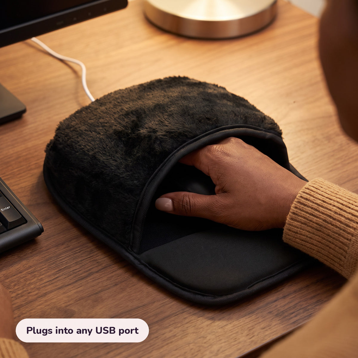 Snugglet Desk Muff in use – Plugs into any USB port