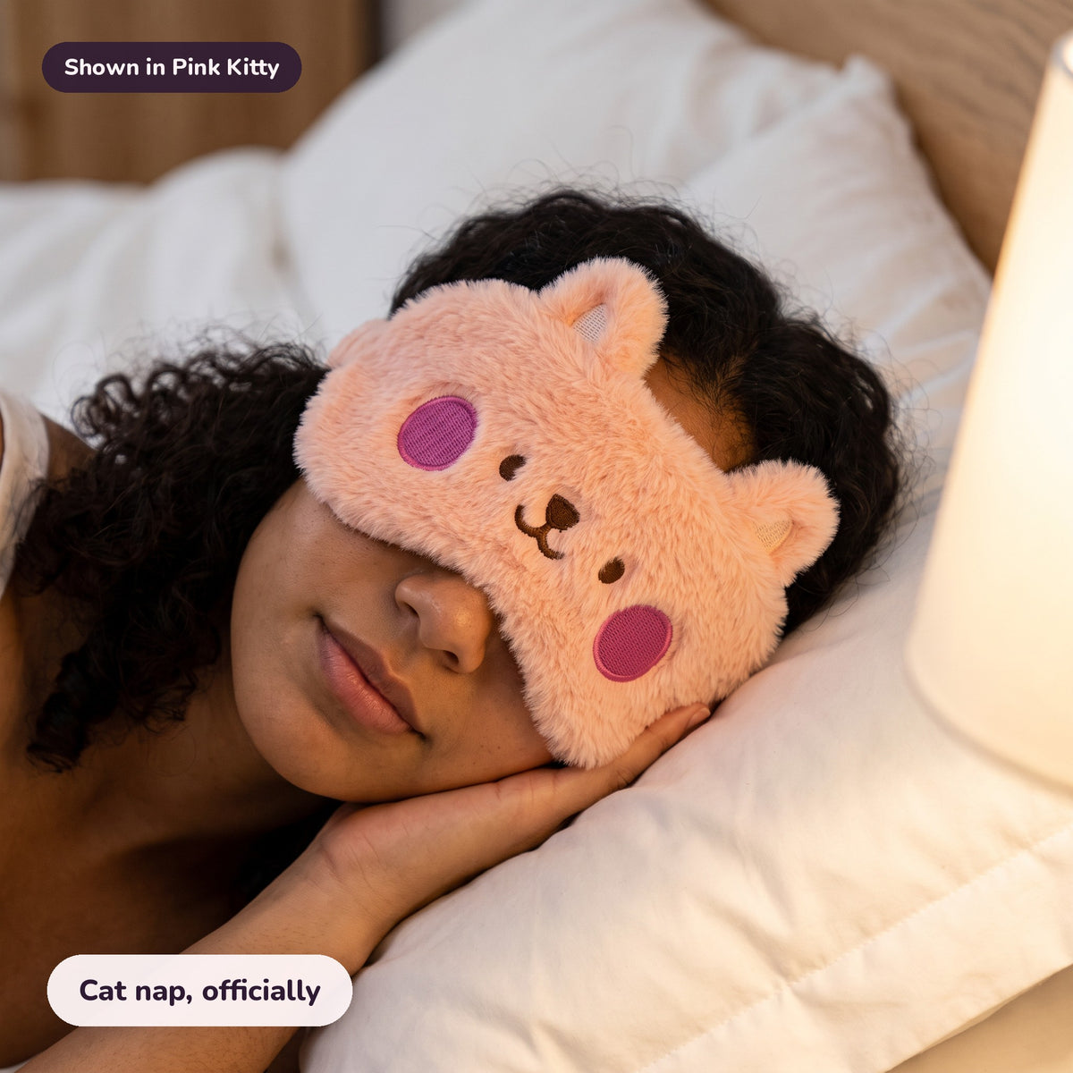 Woman using the Snugglet Nap Kitty in Pink Kitty – Cat nap, officially