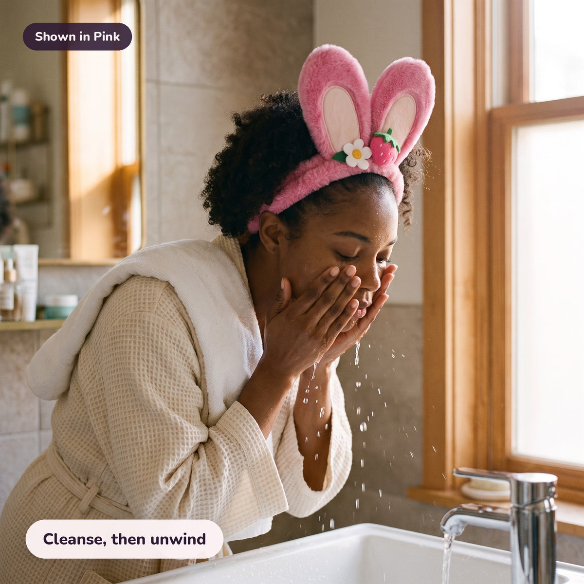 Woman using the Snugglet Spa Band in Pink – Cleanse, then unwind