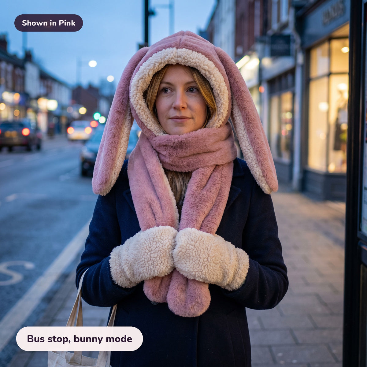 Woman using the Snugglet Bunny Set in Pink – Bus stop, bunny mode