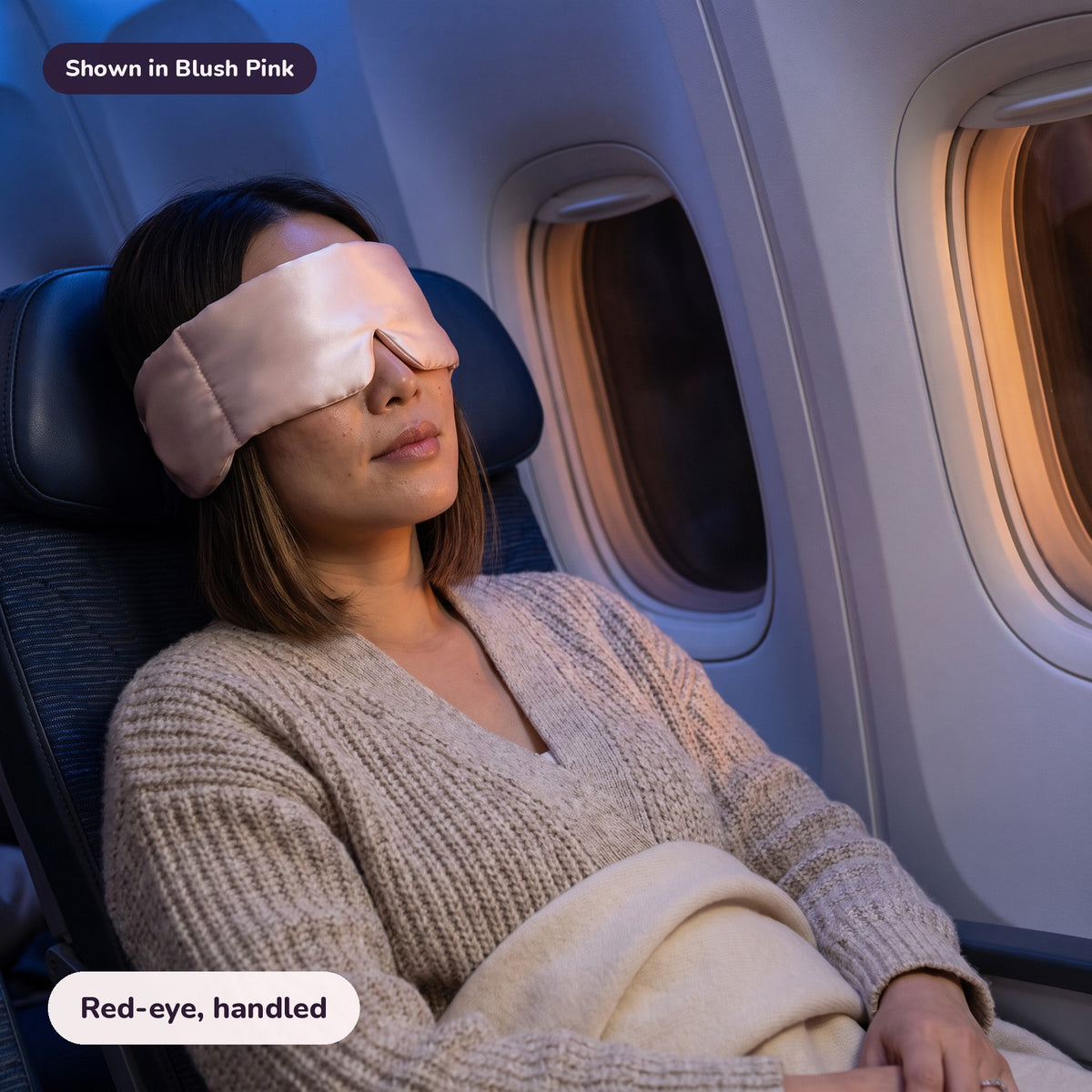 Snugglet Hush Mask in Blush Pink: Red-eye, handled