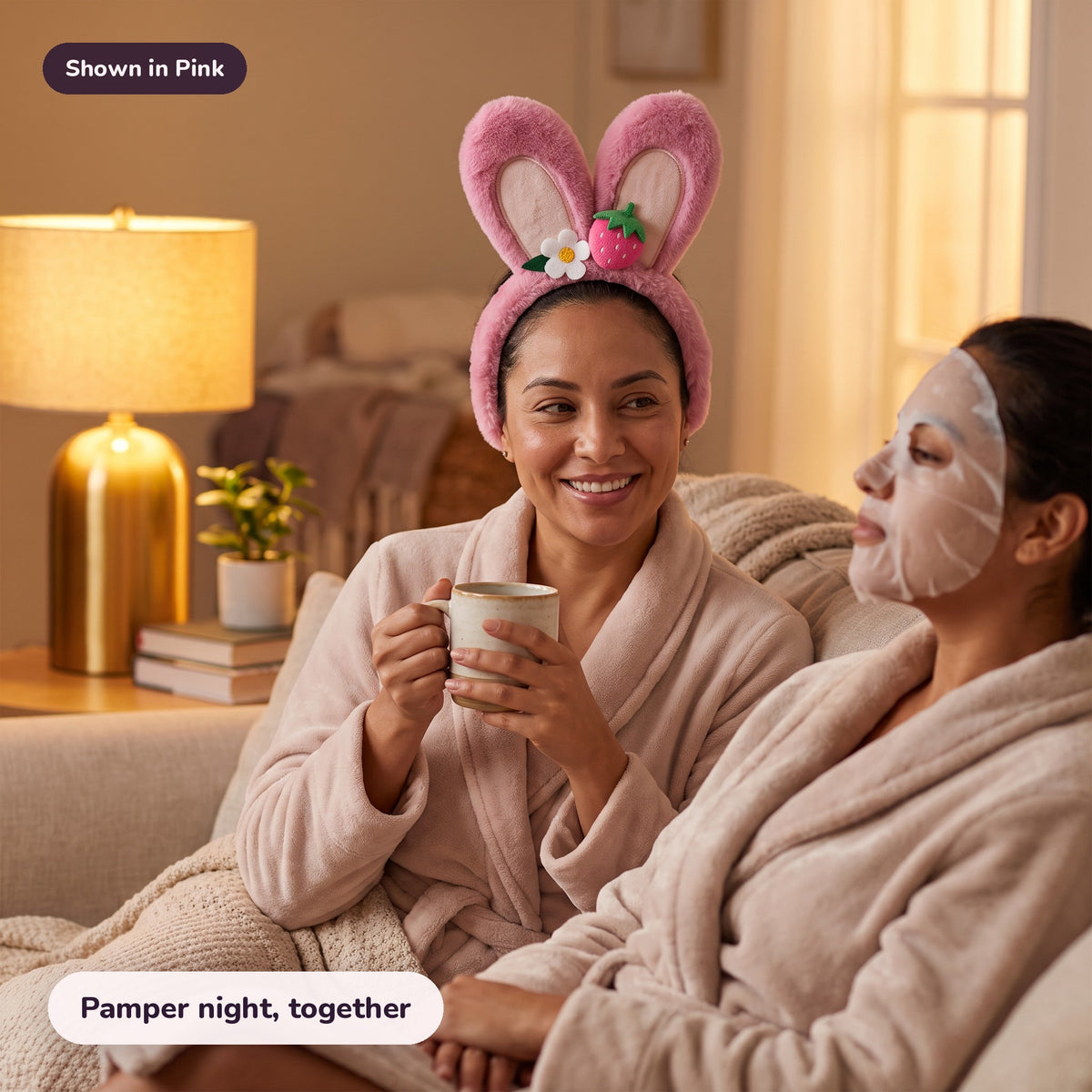 Woman using the Snugglet Spa Band in Pink – Pamper night, together