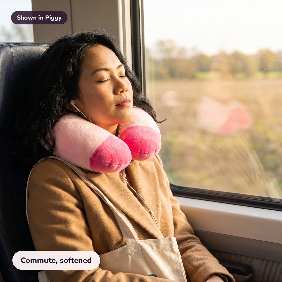 Snugglet Snooze Ring in Piggy: Commute, softened