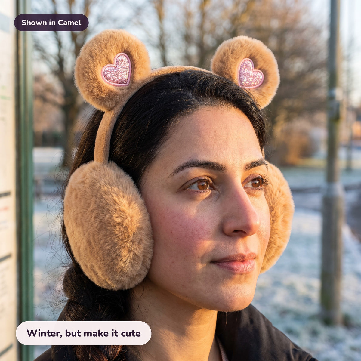 Woman using the Snugglet Bear Muffs in Camel – Winter, but make it cute